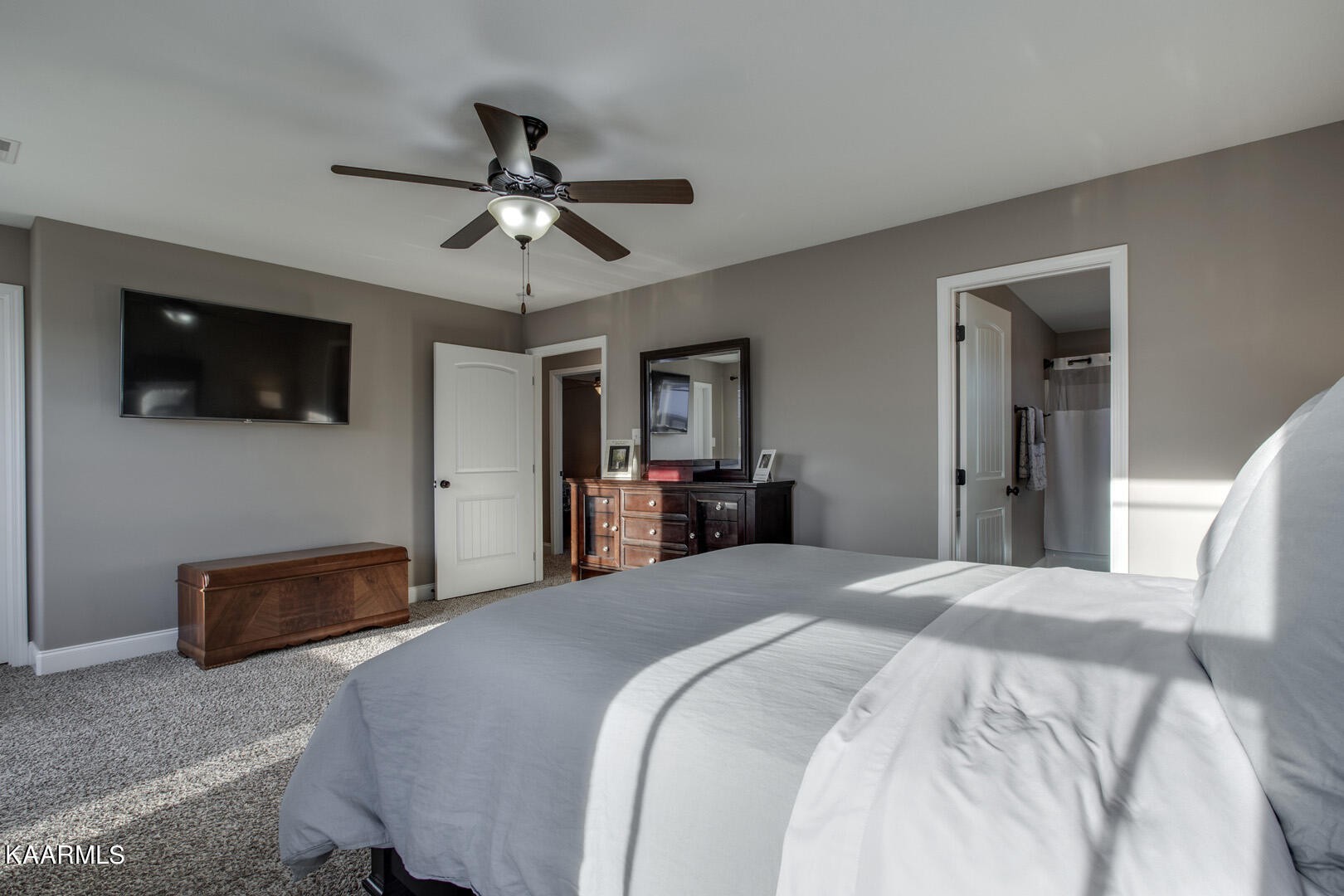 3417 Boulder Point Lane Powell, TN 37849 - Photo 19 of 31 a bedroom with a bed and a flat screen tv