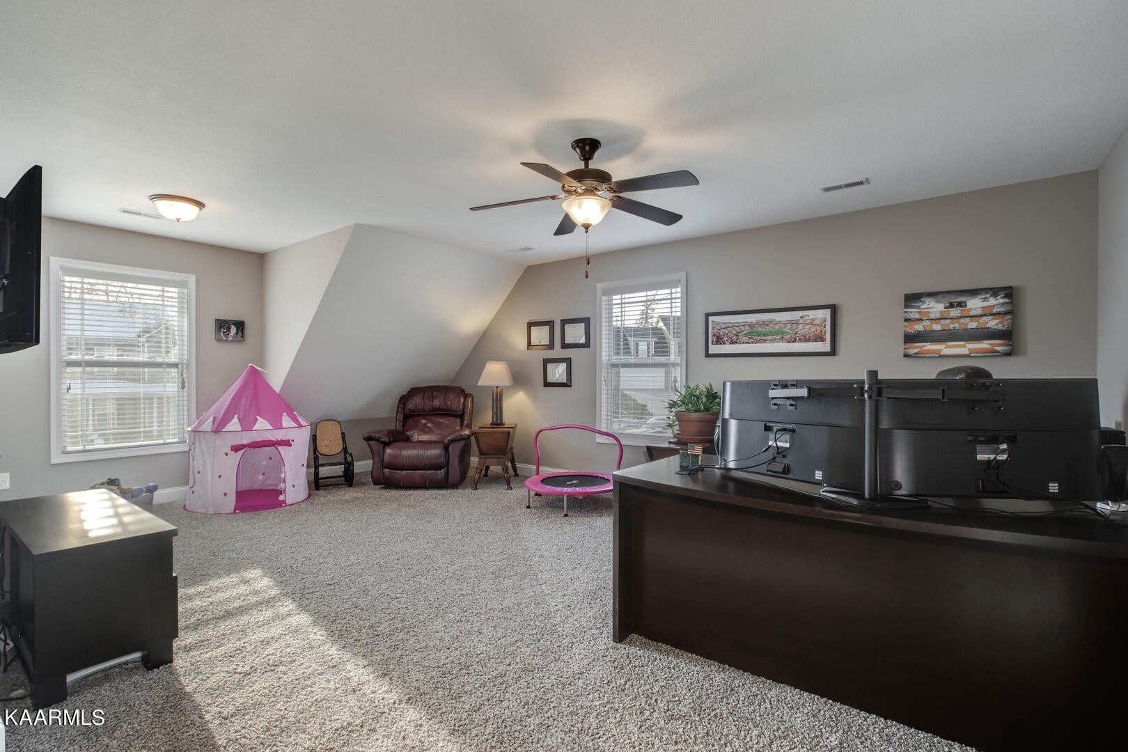 3417 Boulder Point Lane Powell, TN 37849 - Photo 26 of 31 a living room with furniture a flat screen tv and a chandelier