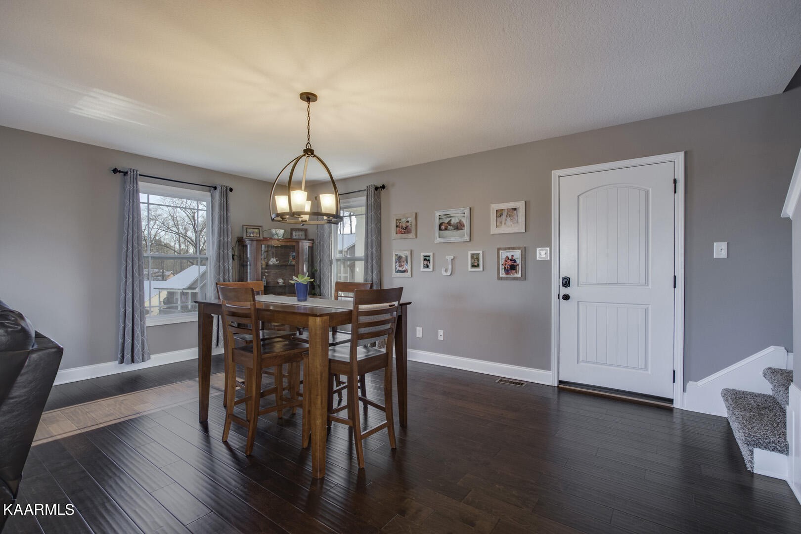 3417 Boulder Point Lane Powell, TN 37849 - Photo 4 of 31 a view of a dining room with furniture window and wooden floor