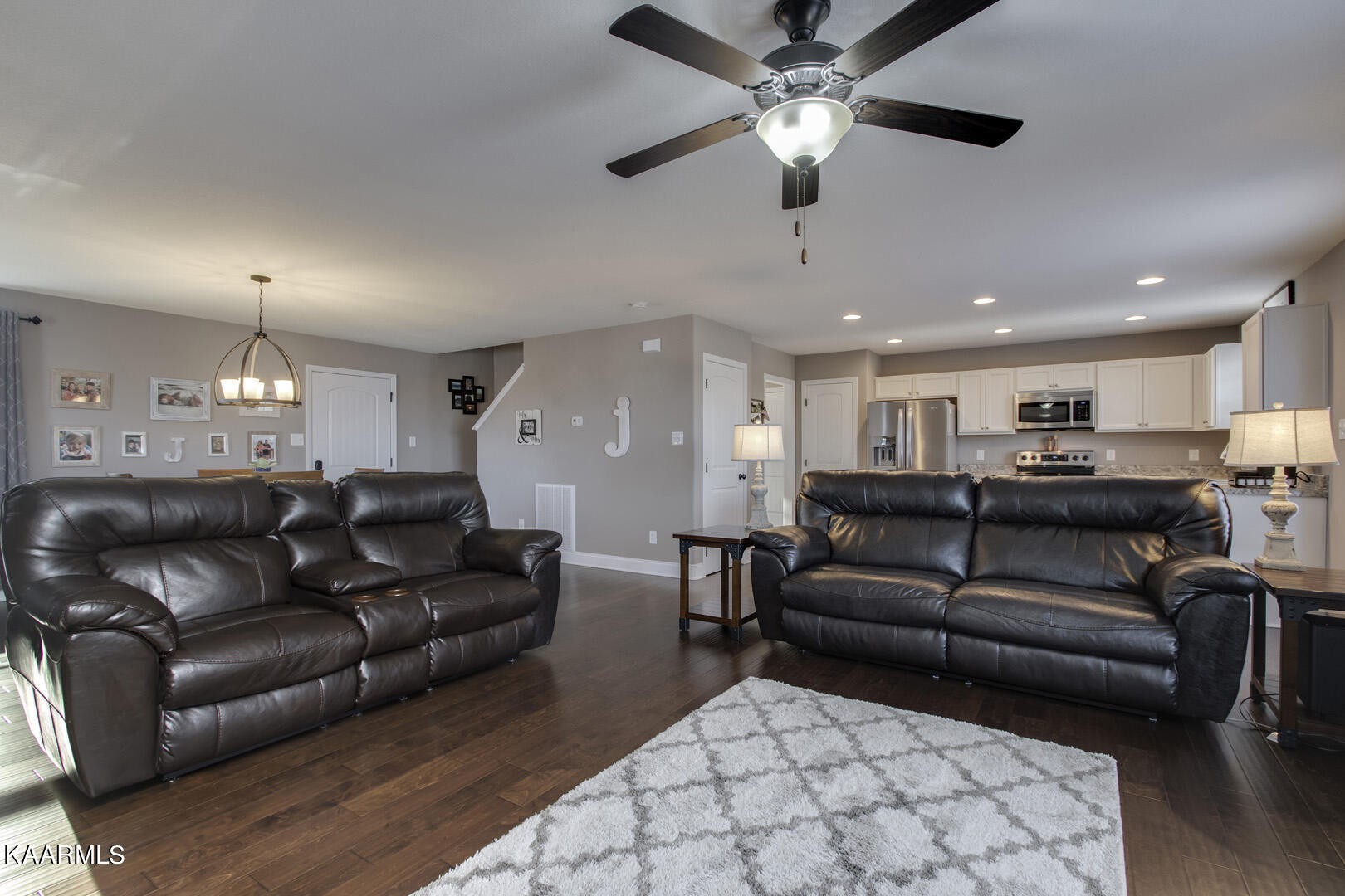 3417 Boulder Point Lane Powell, TN 37849 - Photo 8 of 31 a living room with furniture and a chandelier