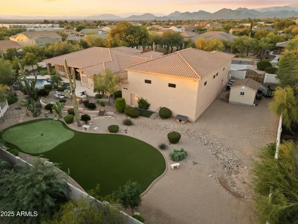 an aerial view of a house with a garden