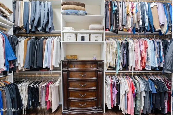 a living room with furniture and a wooden door