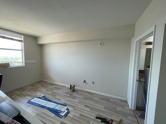 West Flagler Miami, FL 33125 - Photo 12 of 22 an empty room with closet