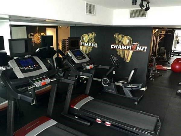 West Flagler Miami, FL 33125 - Photo 20 of 22 a room with gym equipment