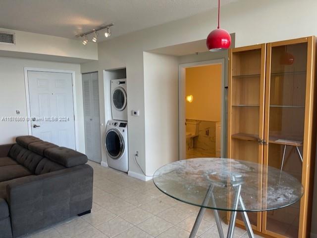 West Flagler Miami, FL 33125 - Photo 4 of 22 a living room with furniture and a chandelier