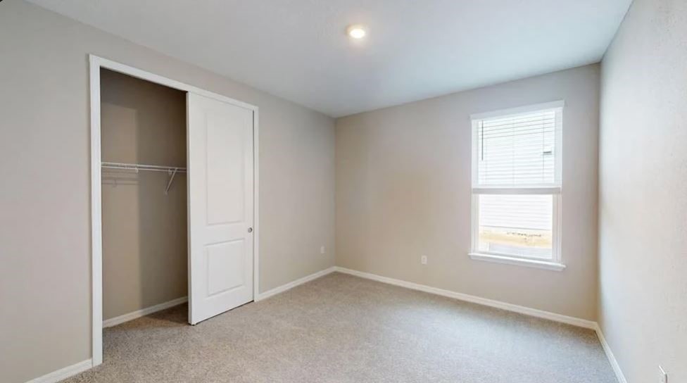 86571 Oar Row Yulee, FL 32097 - Photo 11 of 20 an empty room with windows