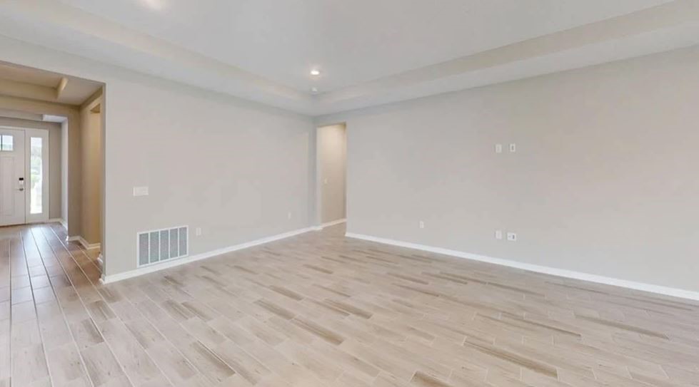 86571 Oar Row Yulee, FL 32097 - Photo 17 of 20 a view of an empty room with wooden floor and a window