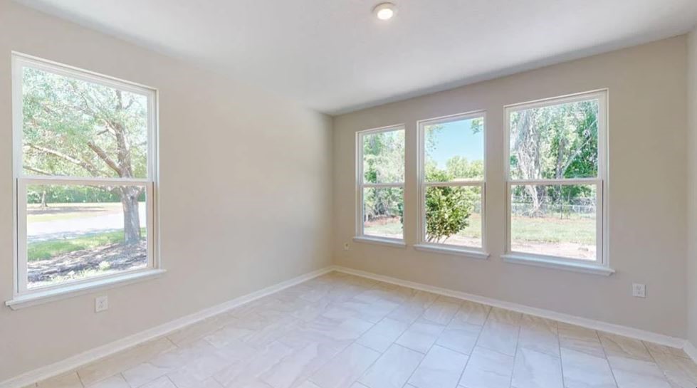 86571 Oar Row Yulee, FL 32097 - Photo 18 of 20 a view of an empty room with a window