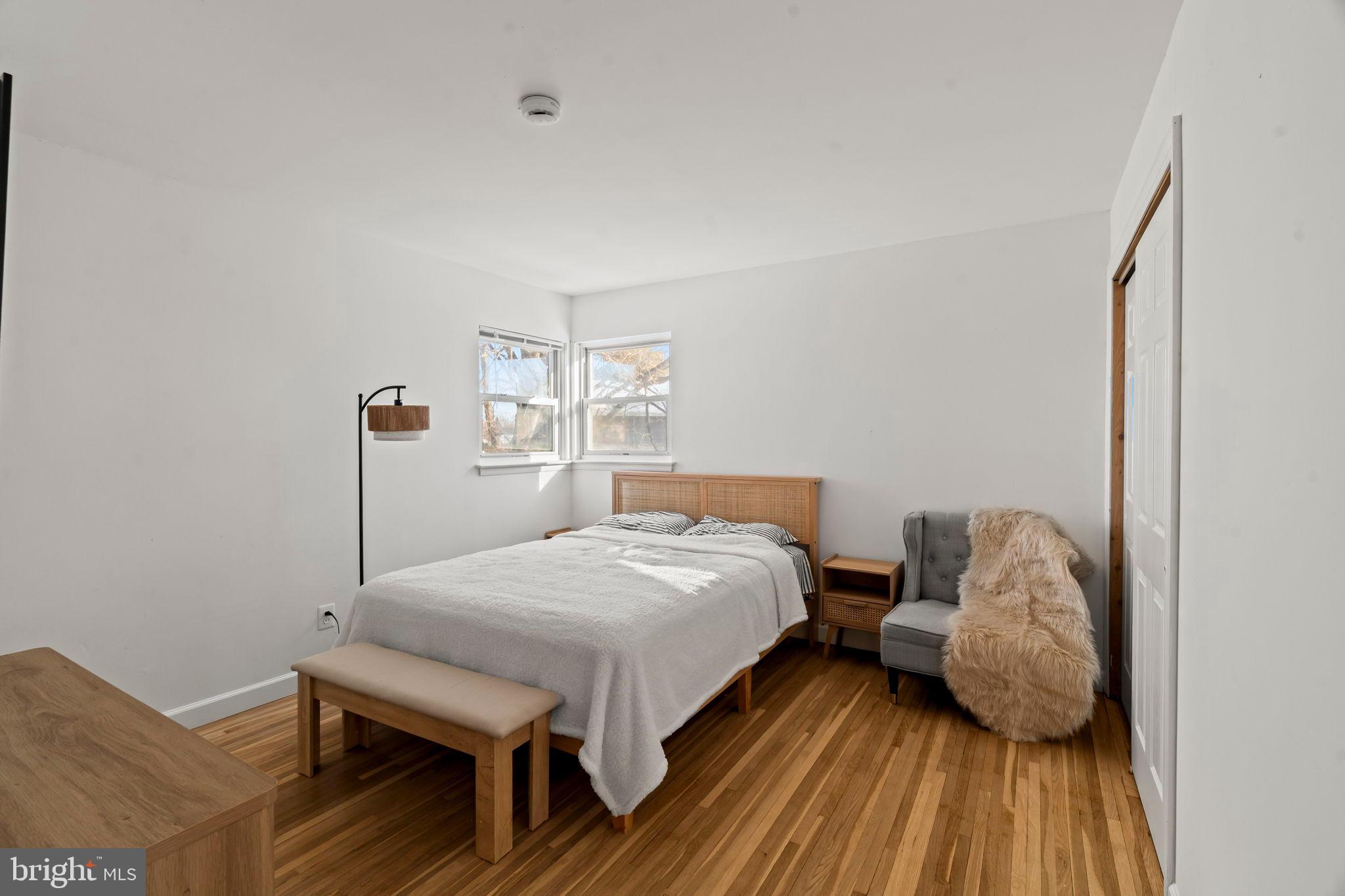 209 Front Street Mount Holly, NJ 08060 - Photo 13 of 35 a bedroom with a bed and a window