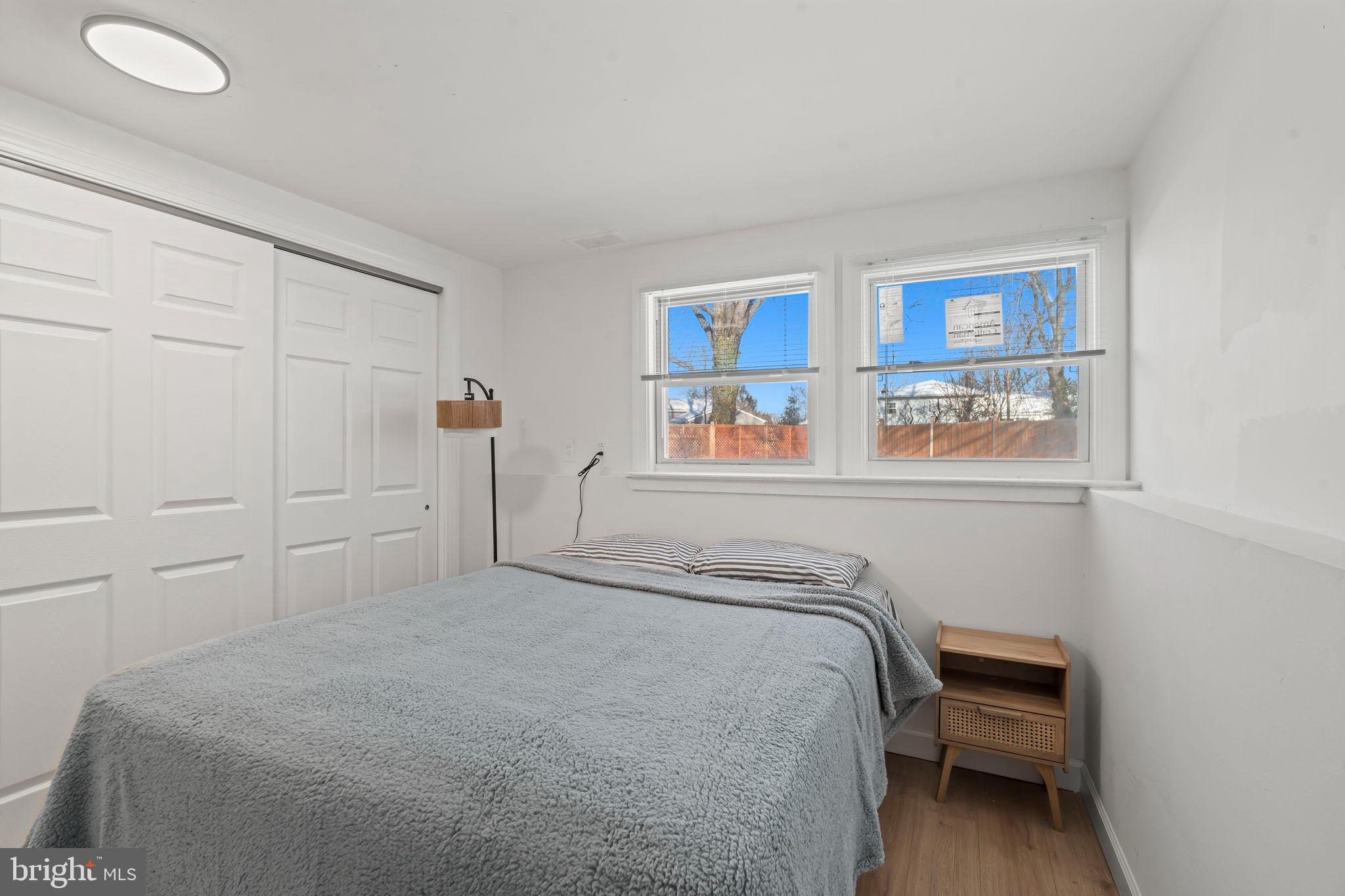 209 Front Street Mount Holly, NJ 08060 - Photo 21 of 35 a bedroom with a bed and a window