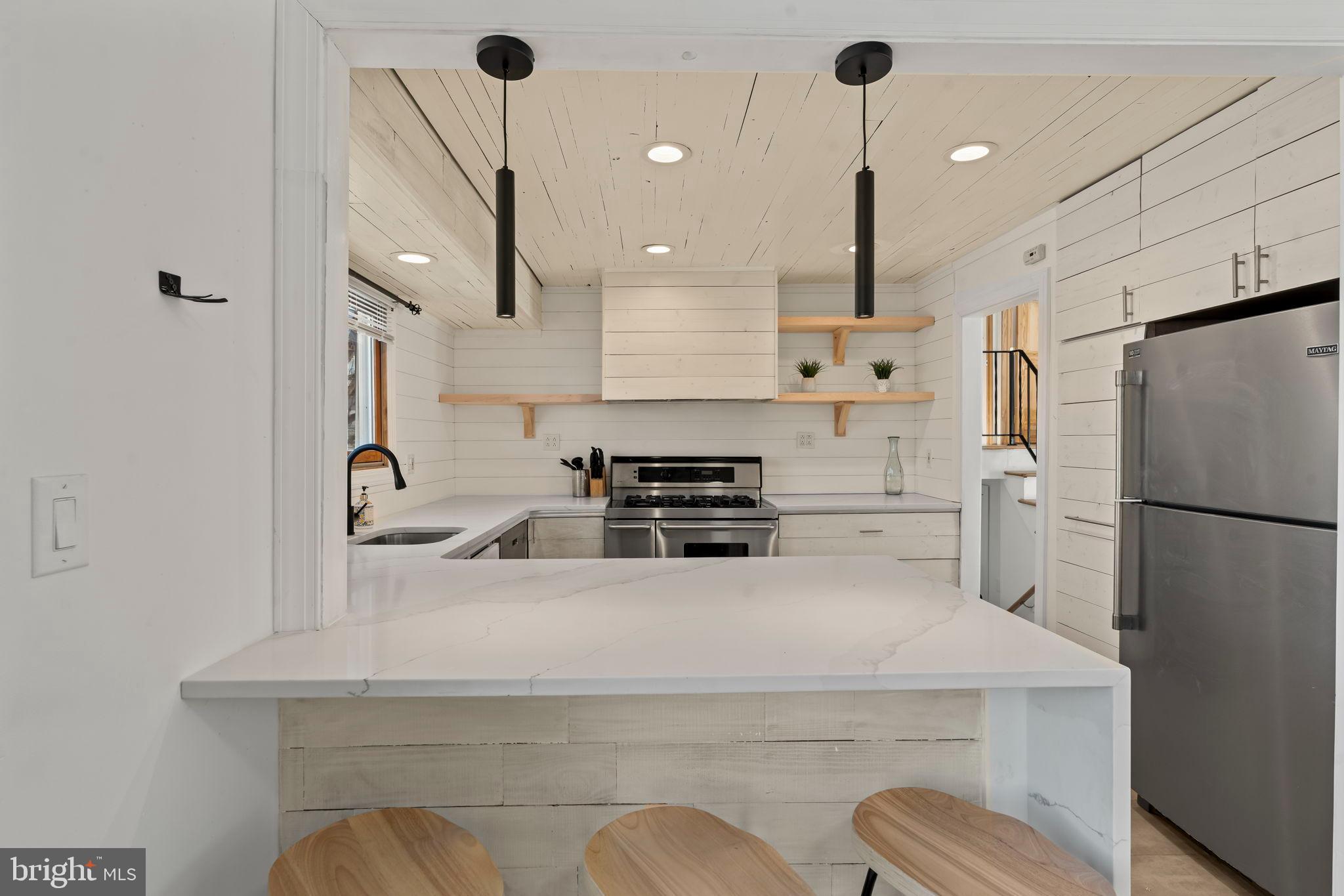 209 Front Street Mount Holly, NJ 08060 - Photo 30 of 35 Modern kitchen with sleek design elements.