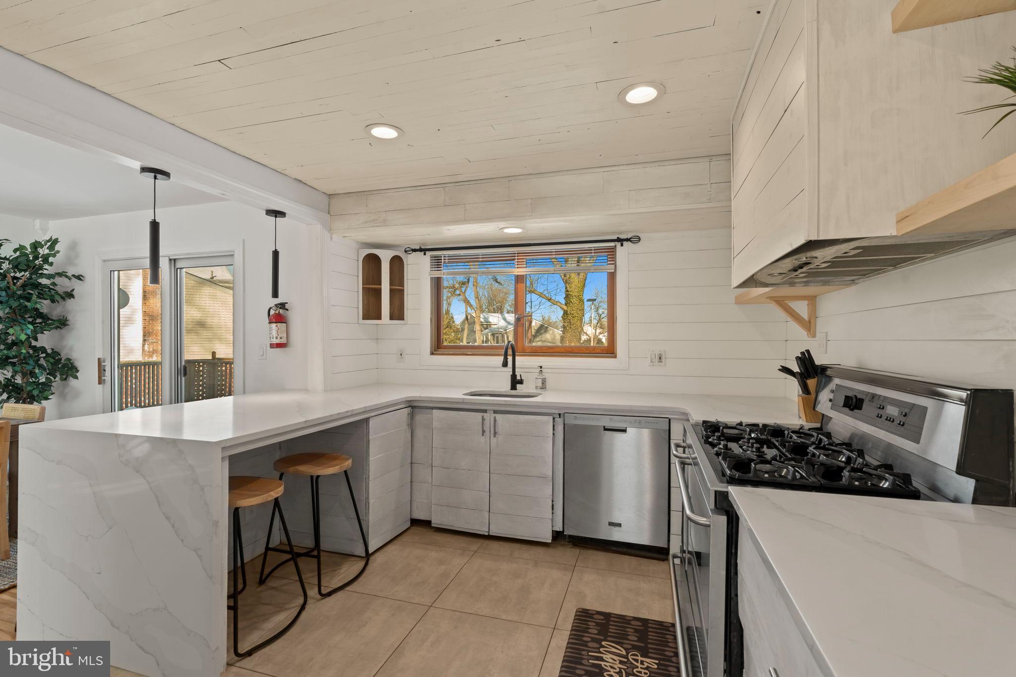 209 Front Street Mount Holly, NJ 08060 - Photo 31 of 35 Modern kitchen with natural light and style.