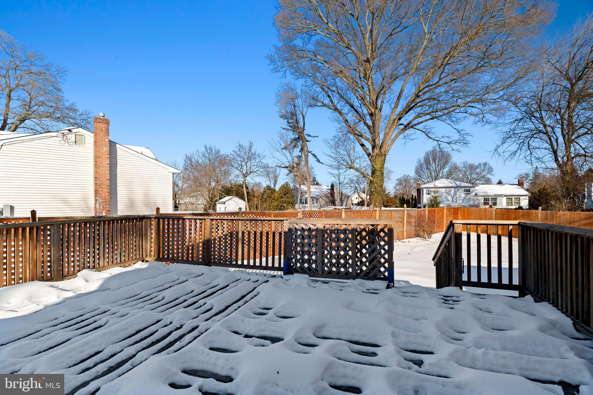209 Front Street Mount Holly, NJ 08060 - Photo 33 of 35 Winter's embrace on a serene backyard retreat.