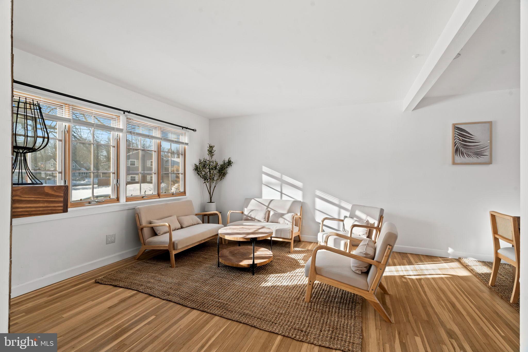 209 Front Street Mount Holly, NJ 08060 - Photo 6 of 35 a living room with furniture and a wooden floor