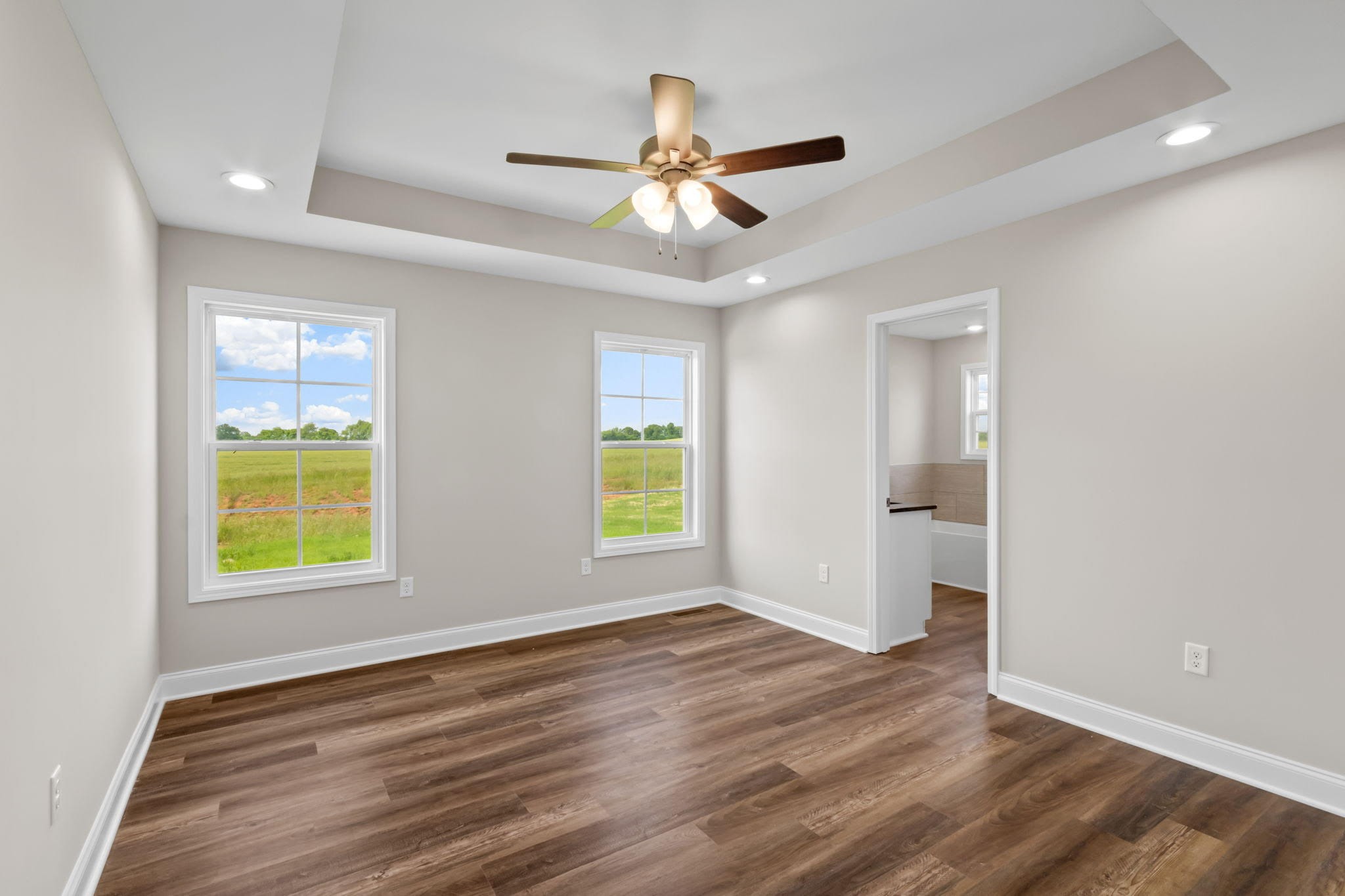 709 Victoria Way Franklin, KY 42134 - Photo 5 of 7 a view of an empty room with wooden floor and a window