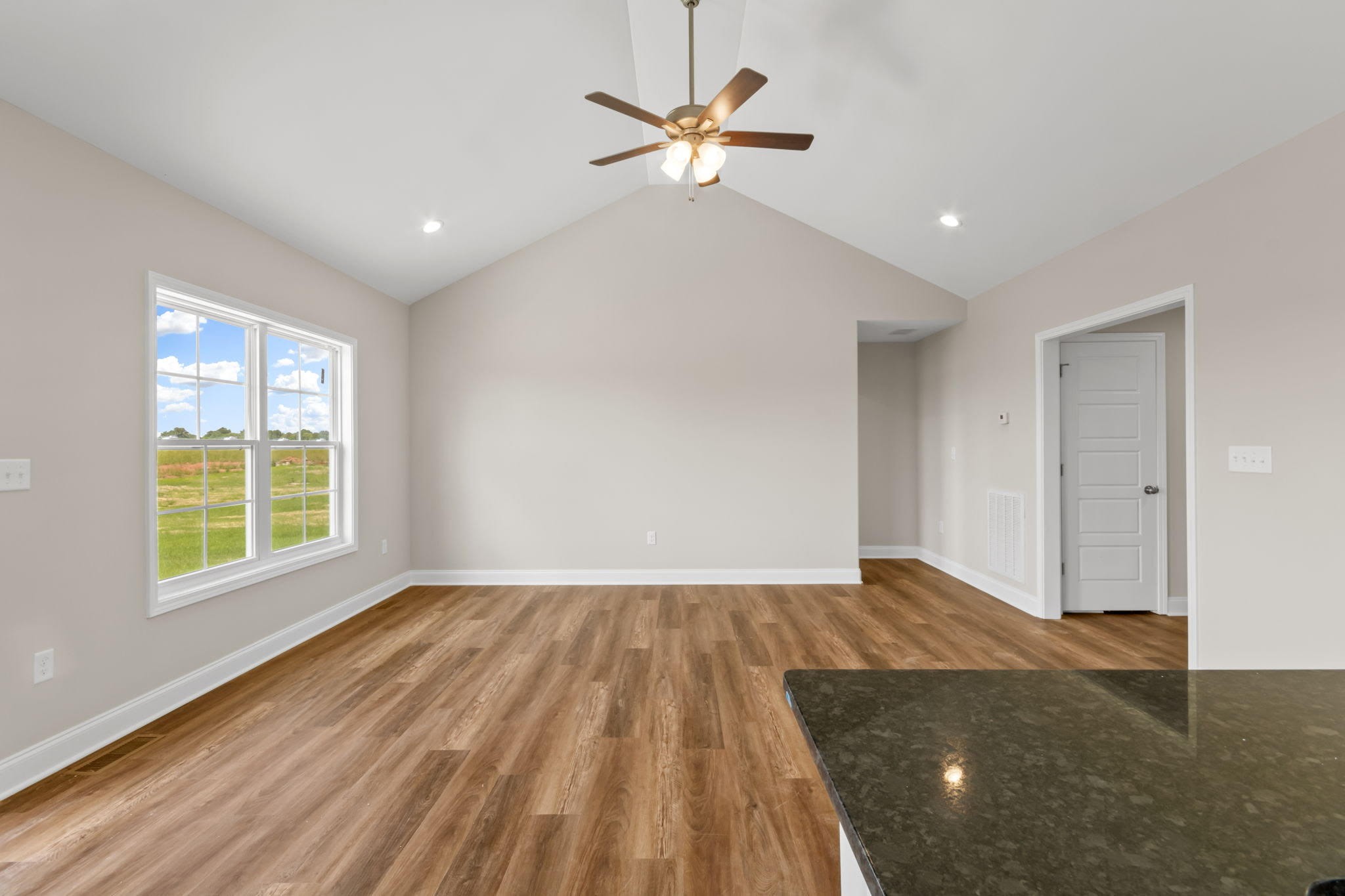 709 Victoria Way Franklin, KY 42134 - Photo 7 of 7 wooden floor in an empty room with a window