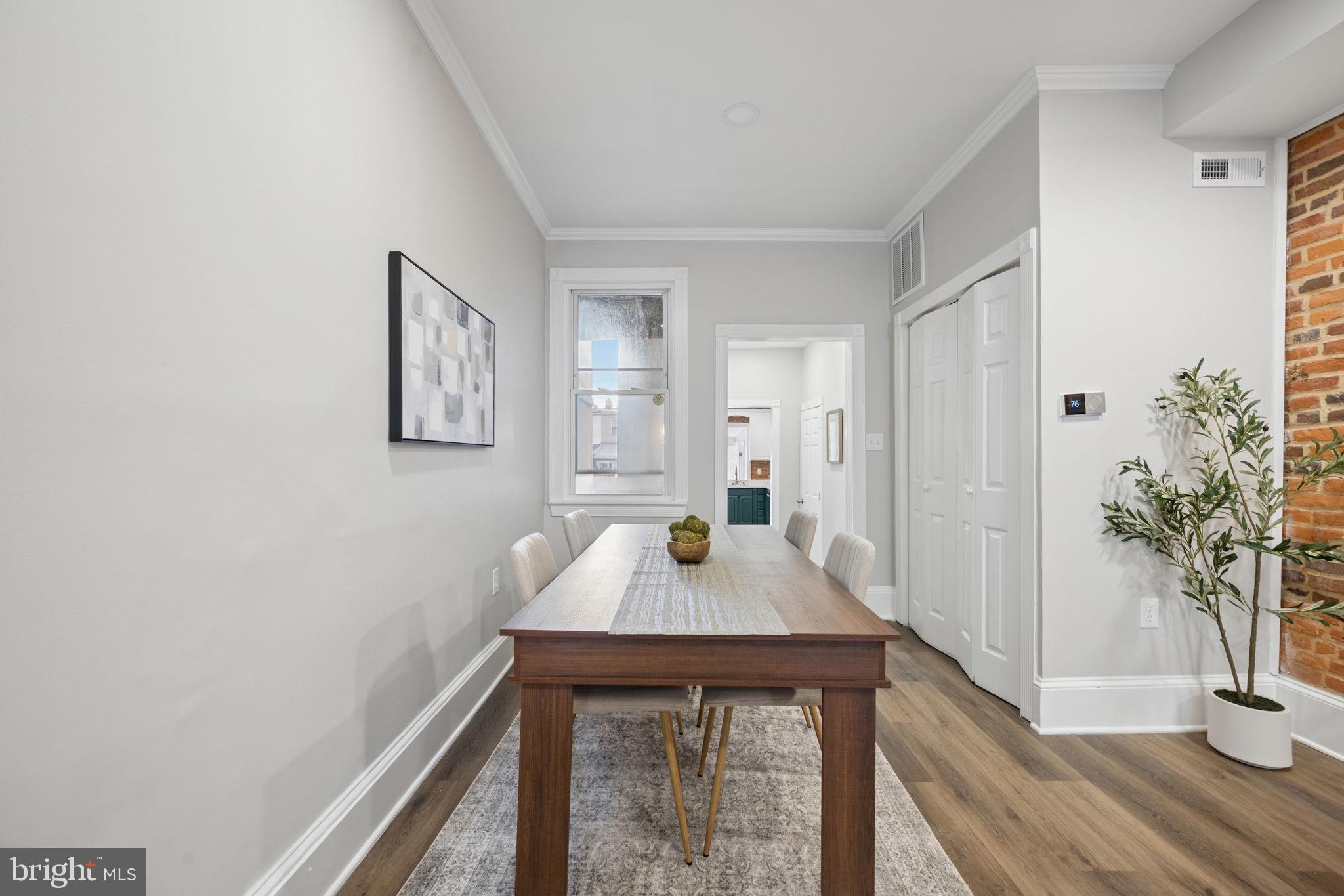 1108 South Clinton Street Baltimore, MD 21224 - Photo 5 of 66 Modern dining space with natural light.