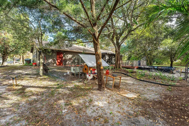 a view of a park with swings and slides