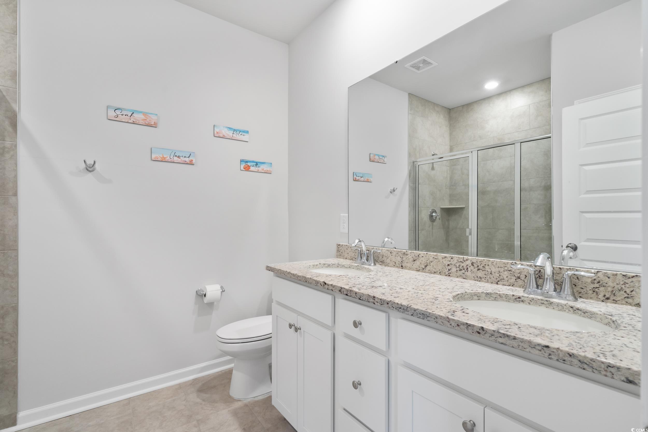 5371 Knobcone Loop, Unit B Myrtle Beach, SC 29577 - Photo 21 of 40 Bathroom featuring toilet, an enclosed shower, van