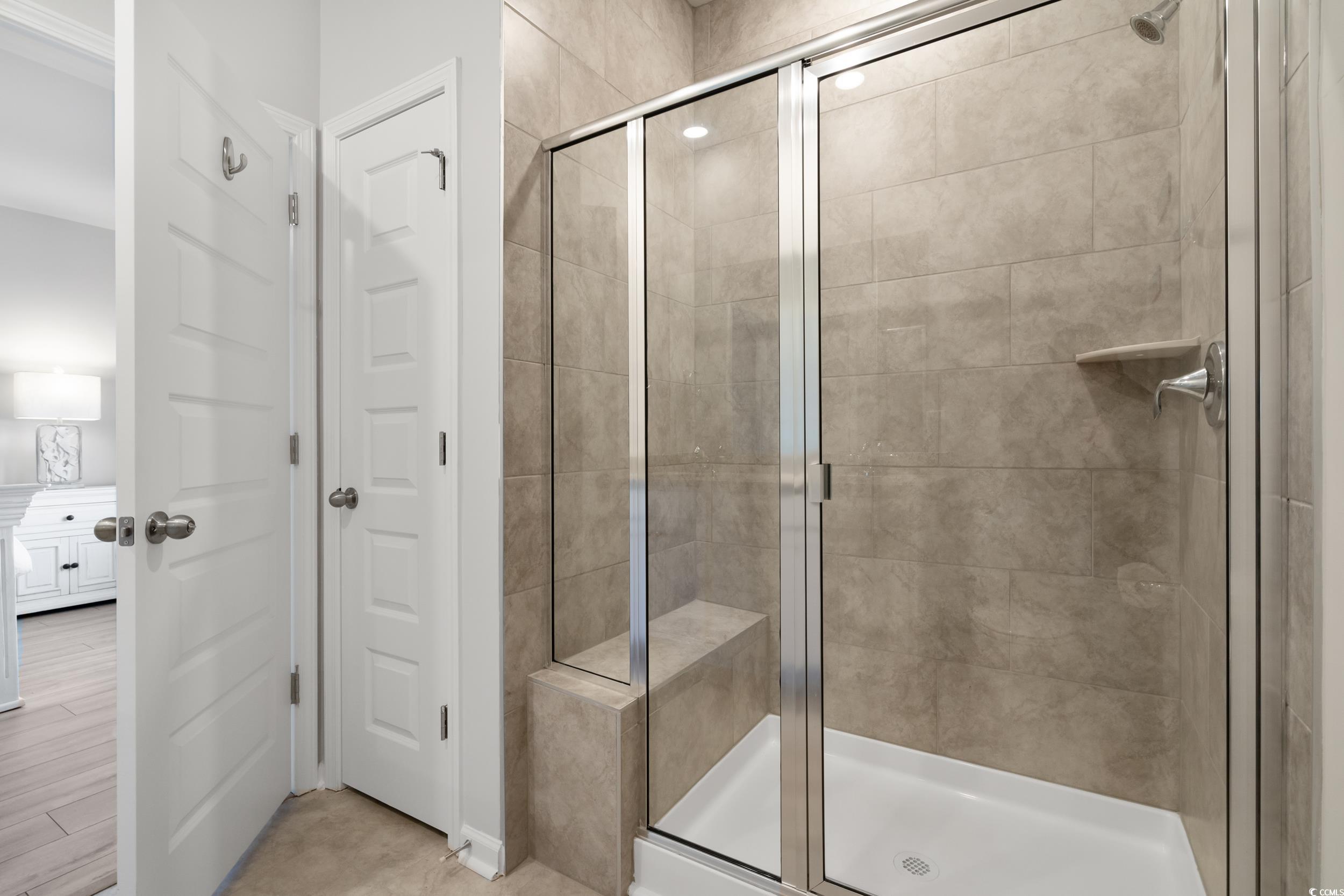 5371 Knobcone Loop, Unit B Myrtle Beach, SC 29577 - Photo 22 of 40 Bathroom with a shower with door