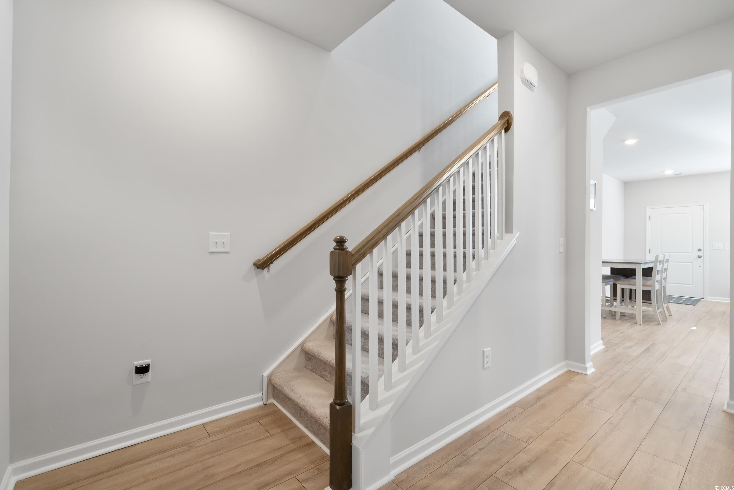 5371 Knobcone Loop, Unit B Myrtle Beach, SC 29577 - Photo 24 of 40 Stairs featuring hardwood / wood-style floors