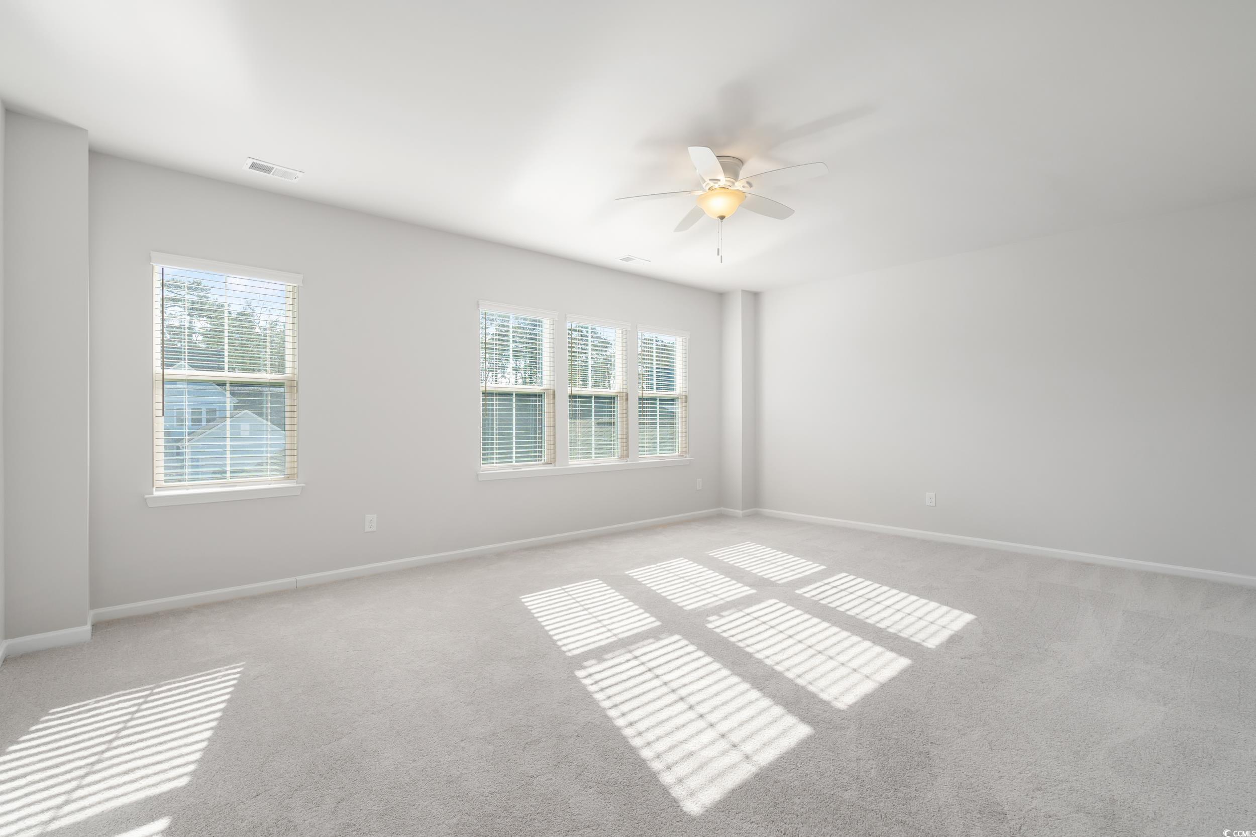 5371 Knobcone Loop, Unit B Myrtle Beach, SC 29577 - Photo 25 of 40 Carpeted empty room featuring ceiling fan