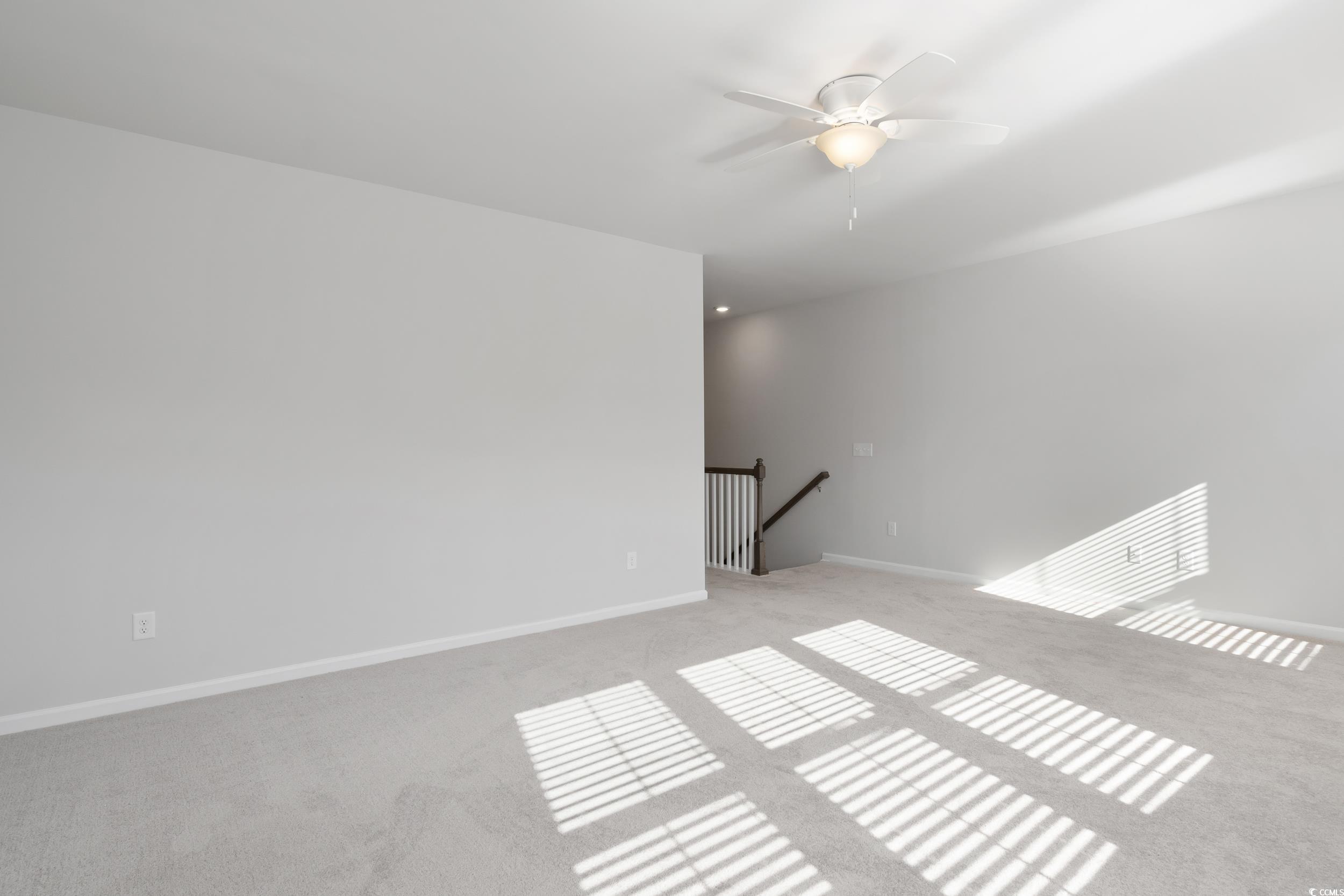 5371 Knobcone Loop, Unit B Myrtle Beach, SC 29577 - Photo 26 of 40 Spare room featuring ceiling fan and light carpet
