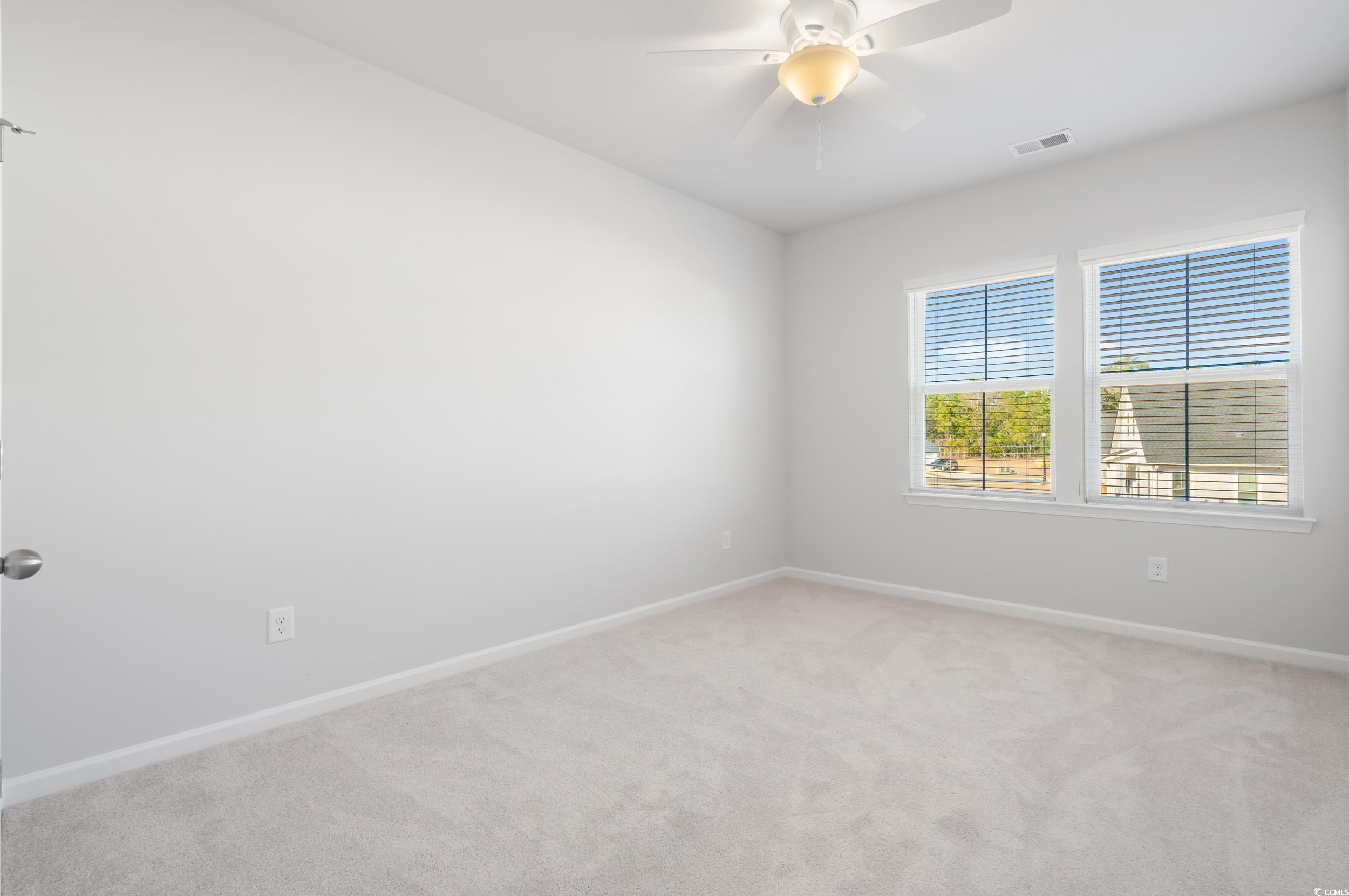 5371 Knobcone Loop, Unit B Myrtle Beach, SC 29577 - Photo 28 of 40 Spare room featuring ceiling fan and light colored
