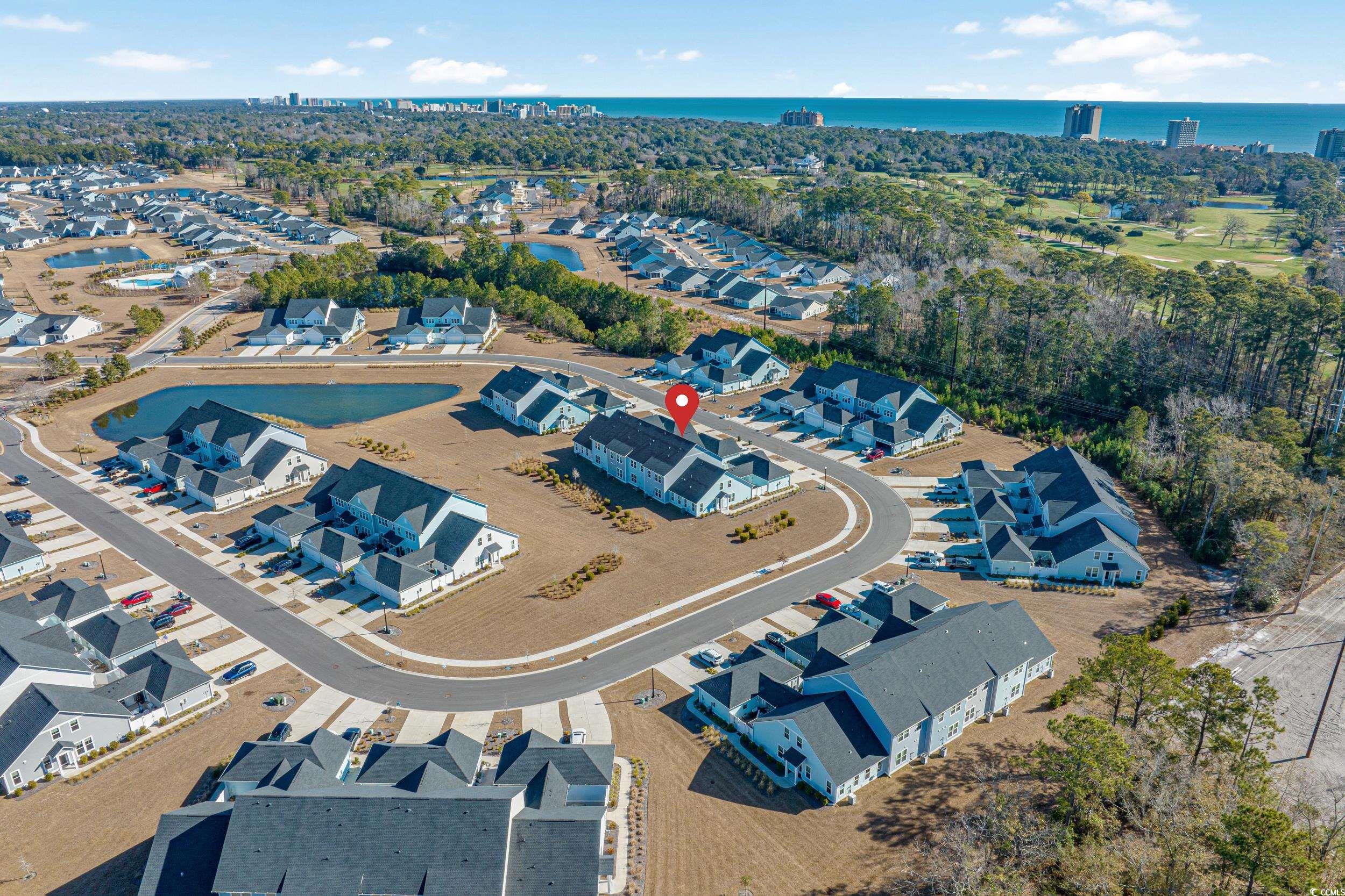 5371 Knobcone Loop, Unit B Myrtle Beach, SC 29577 - Photo 4 of 40 Aerial view featuring a water view