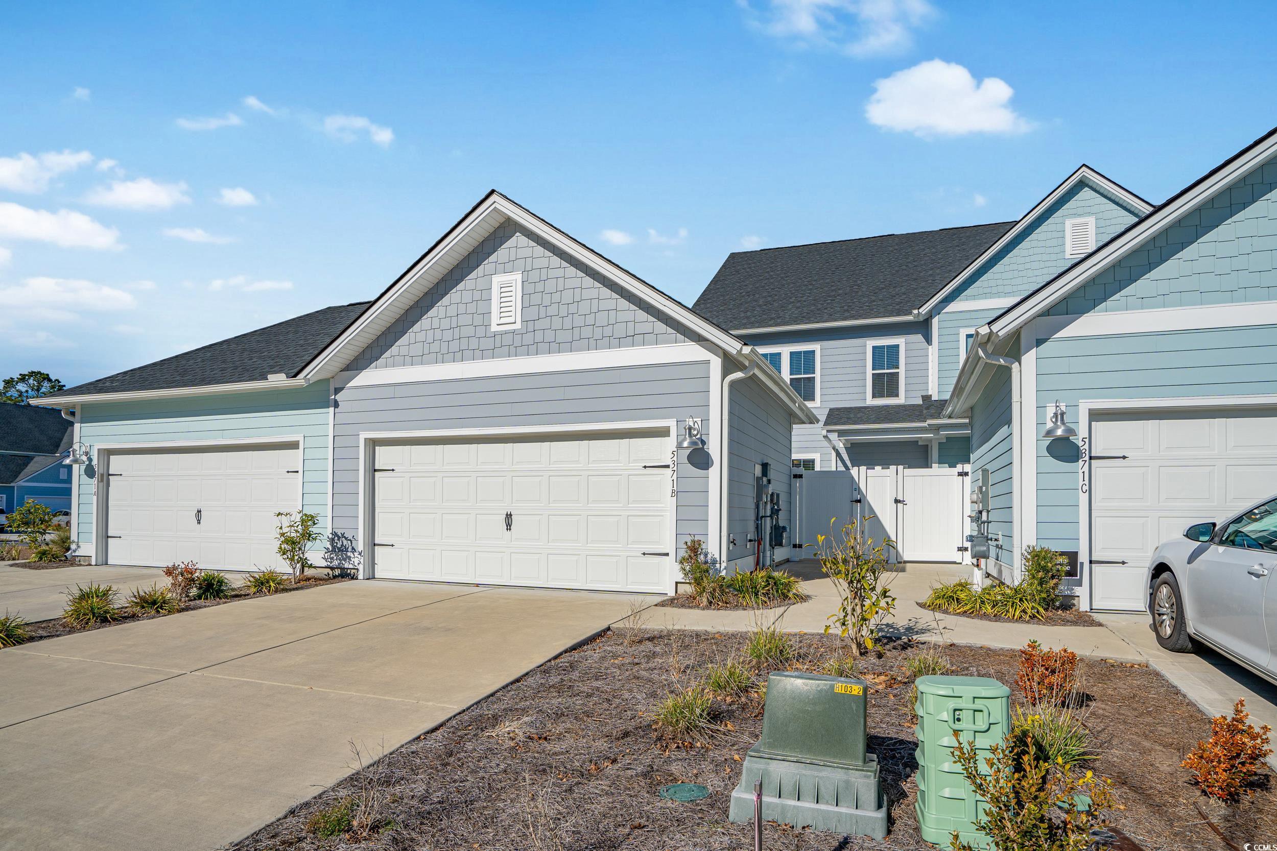 5371 Knobcone Loop, Unit B Myrtle Beach, SC 29577 - Photo 5 of 40 View of front of home with a garage