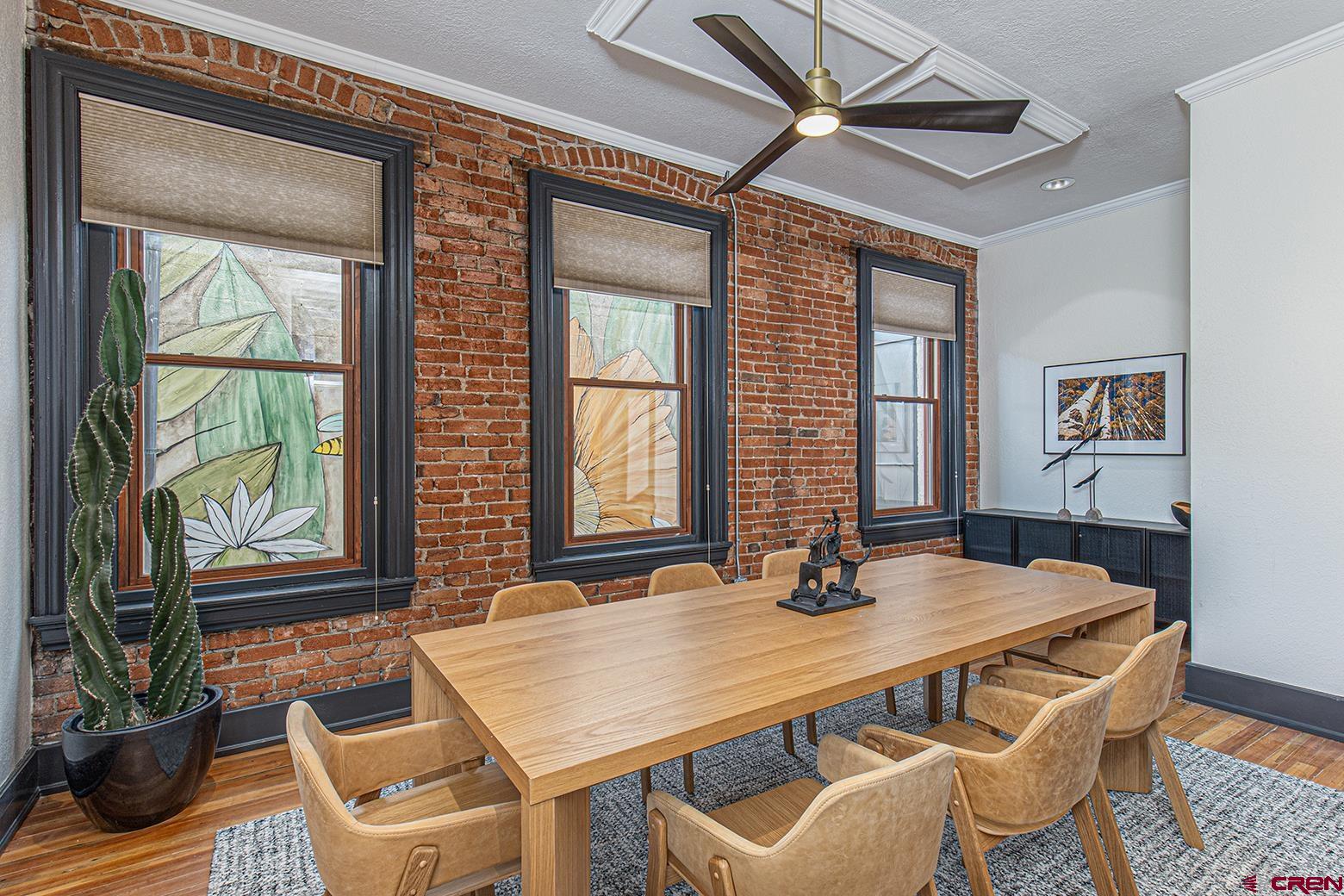 813 Main Avenue, Unit 304 Durango, CO 81301 - Photo 14 of 20 a dining room with furniture and window