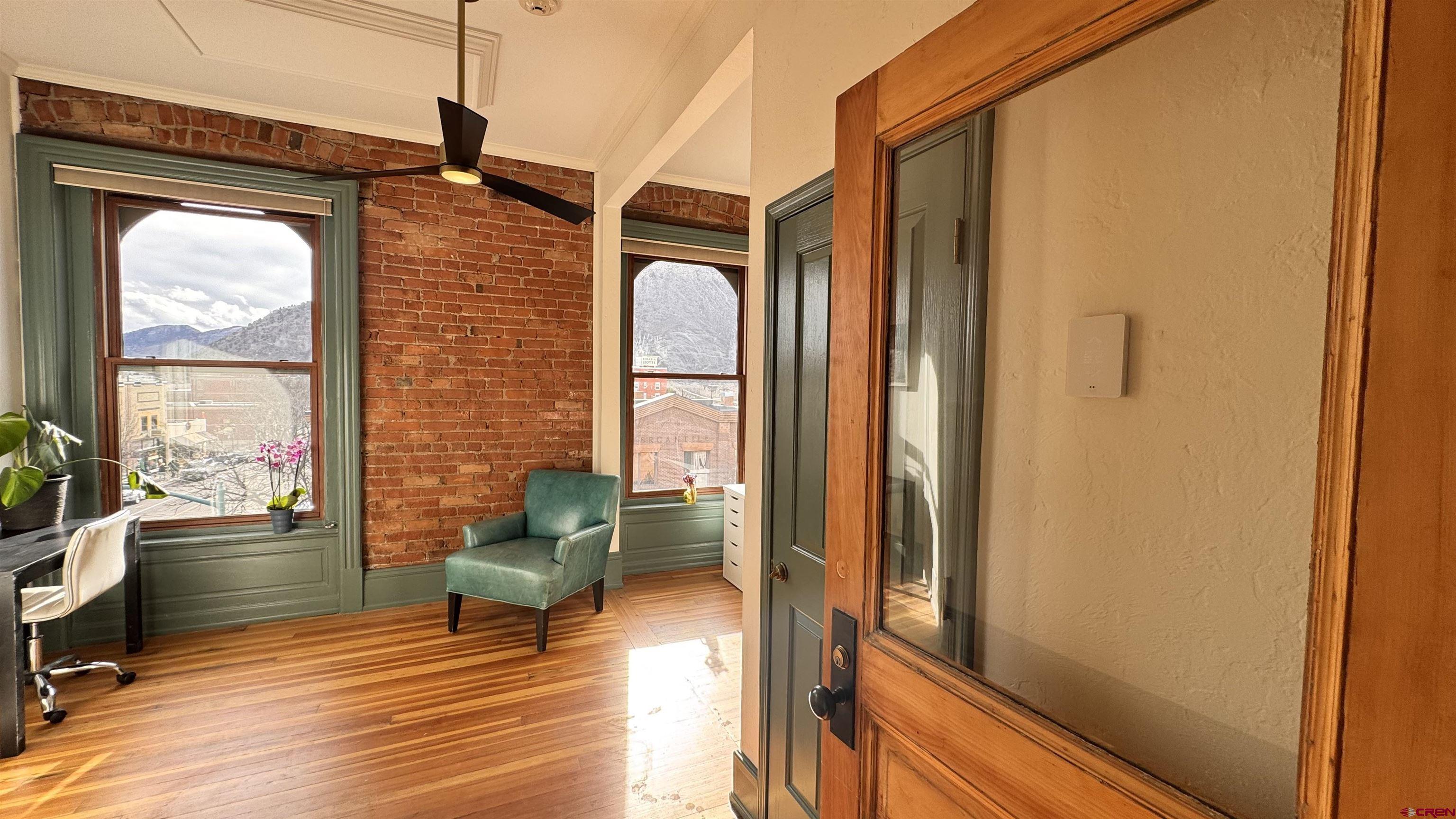 813 Main Avenue, Unit 304 Durango, CO 81301 - Photo 2 of 20 a living room with furniture and a window