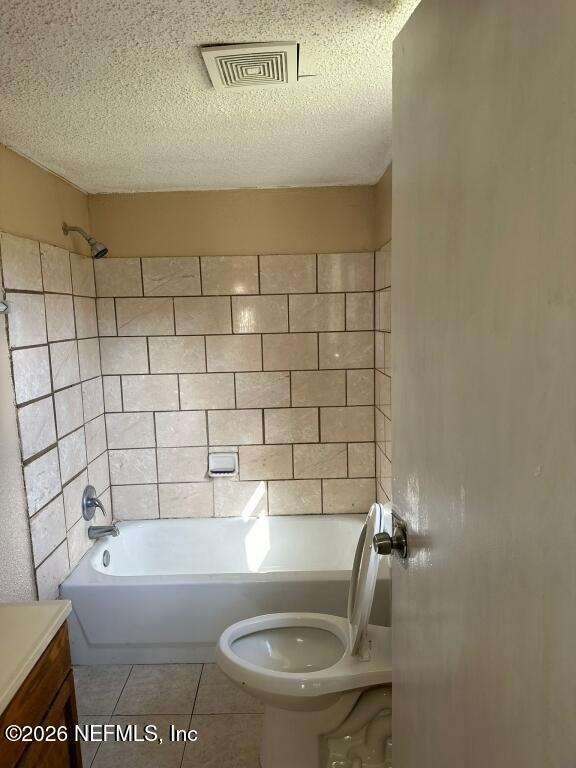 3219 Thomas Street Jacksonville, FL 32254 - Photo 3 of 6 a bathroom with a sink a toilet and a mirror