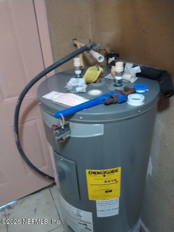 3219 Thomas Street Jacksonville, FL 32254 - Photo 6 of 6 a view of a dining room with furniture and wooden floor