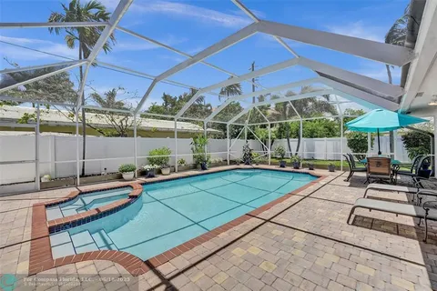 a picture of a bathroom with mirror
