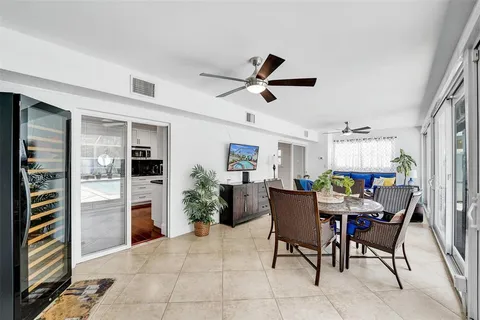 a view of a livingroom with furniture and a window