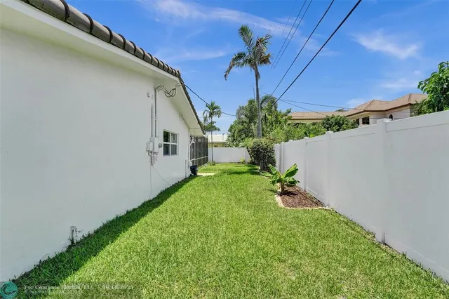 a view of a backyard with plants
