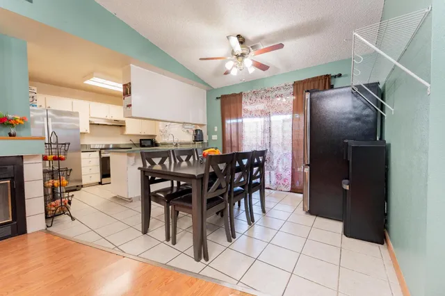 a view of a dining room with furniture
