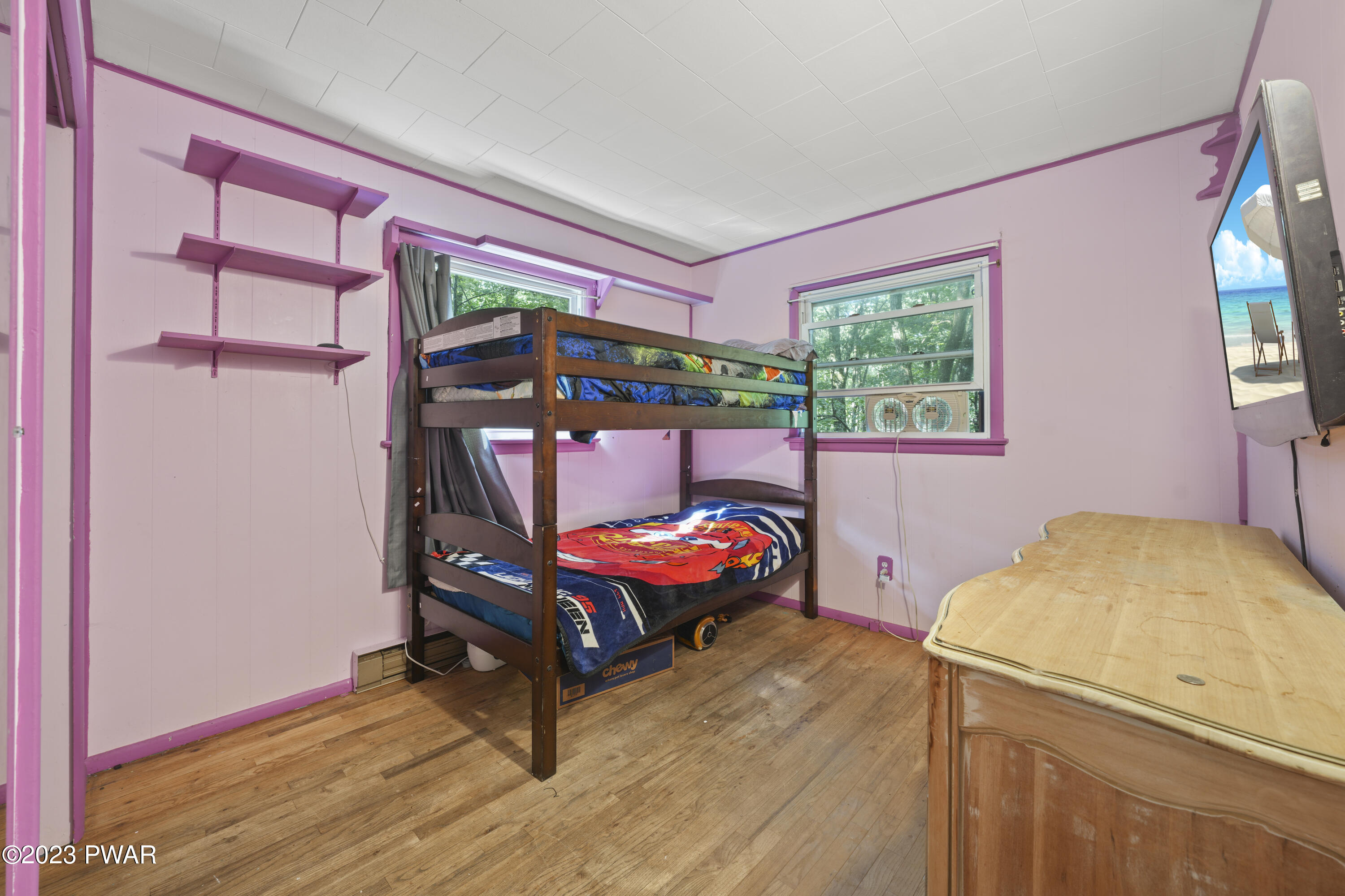 161 Butternut Road Milford, PA 18337 - Photo 15 of 26 a bedroom with a bed and a window