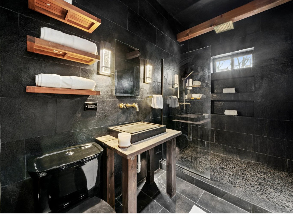 1067 West Balmoral Avenue, Unit 2 Chicago, IL 60640 - Photo 10 of 15 a bathroom with a sink a toilet and shower