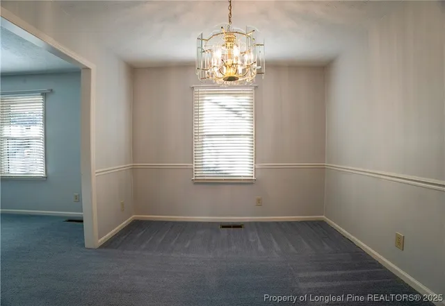 an empty room that has a window