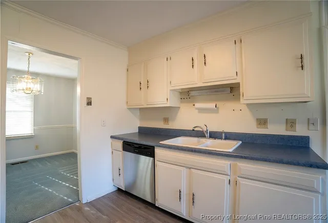 a view of hallway with wooden floor