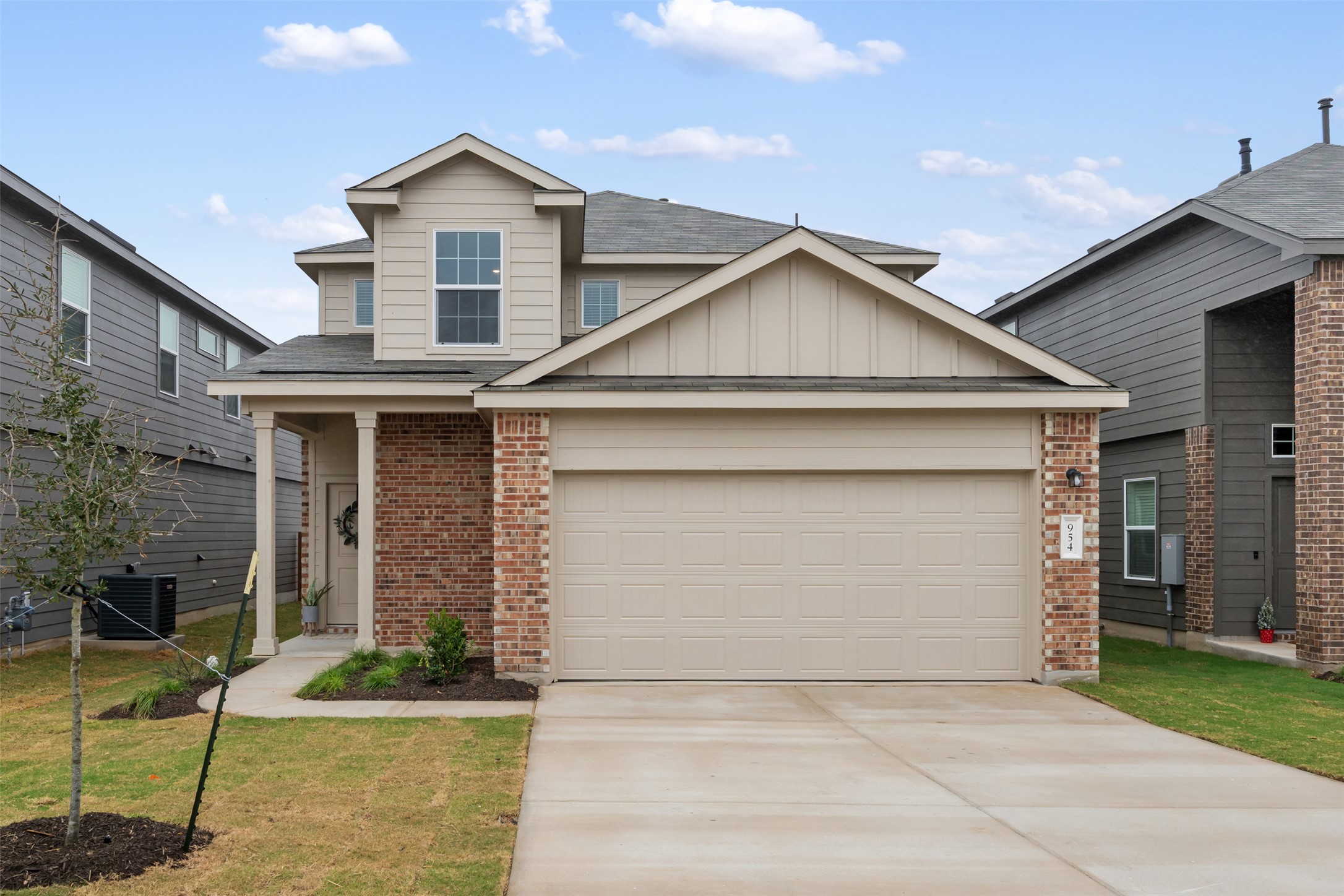 954 Soapstone Pass Maxwell, TX 78656 - Photo 2 of 40 a front view of a house with garden