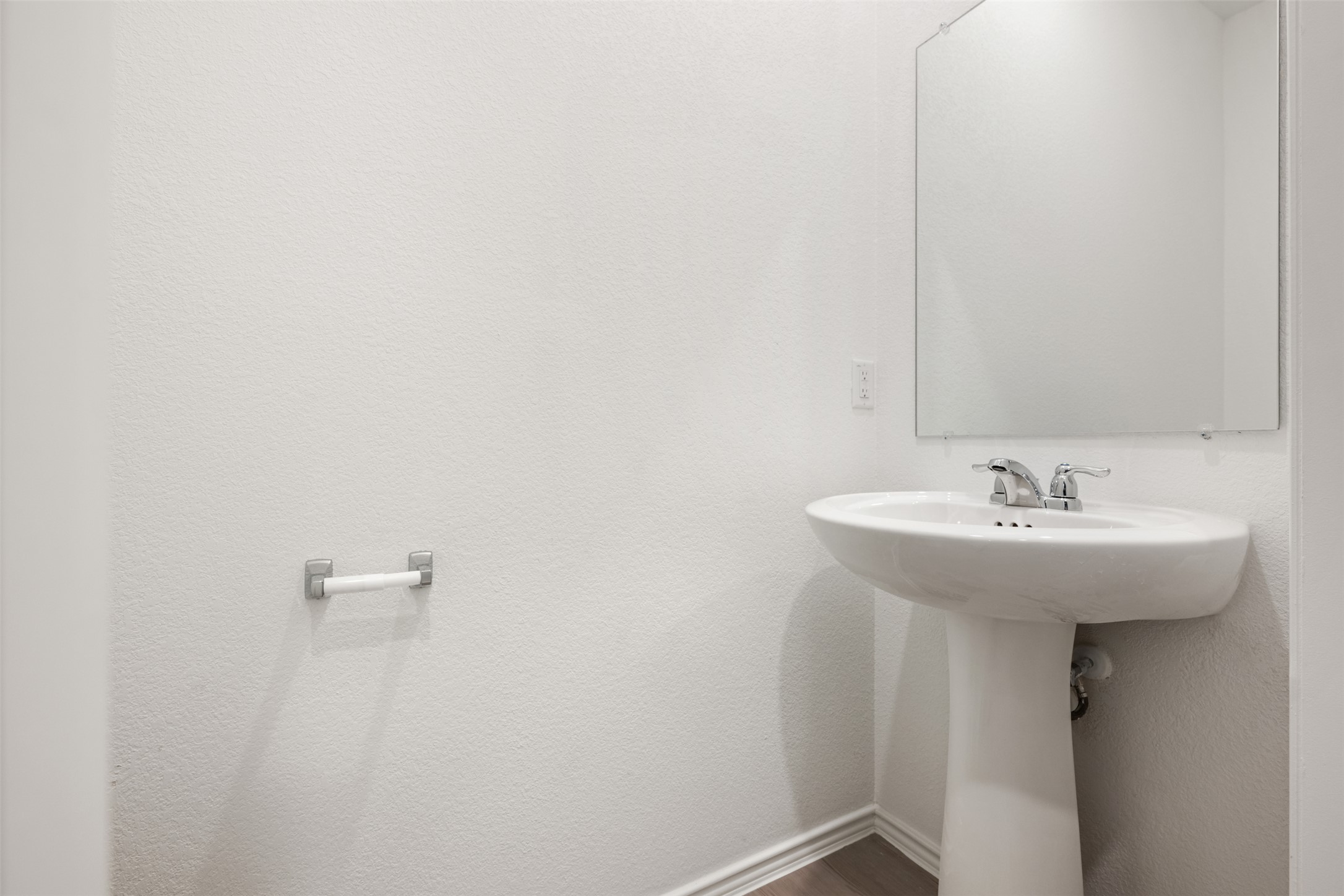 954 Soapstone Pass Maxwell, TX 78656 - Photo 24 of 40 a bathroom with a sink and mirror