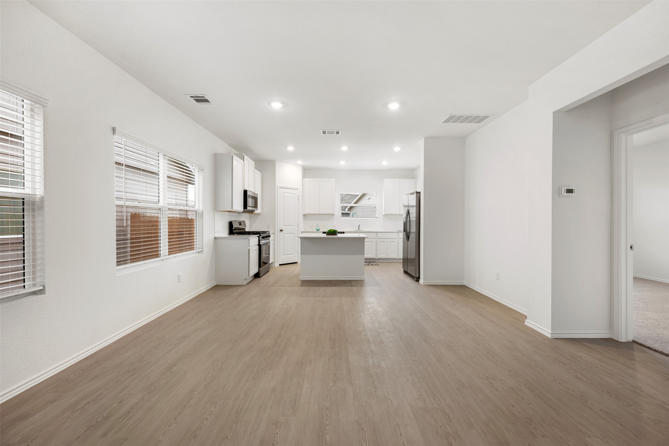 954 Soapstone Pass Maxwell, TX 78656 - Photo 6 of 40 a living room with furniture and large windows