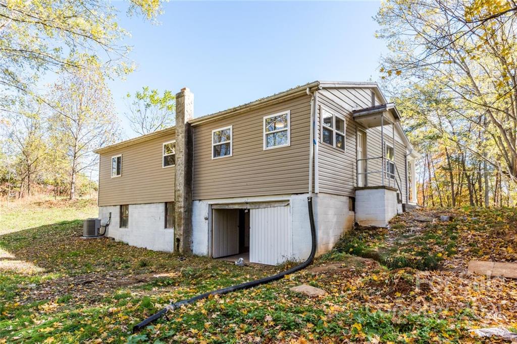 87-j R J R Sayles Road Canton, NC 28716 - Photo 22 of 22 a view of a house with a yard