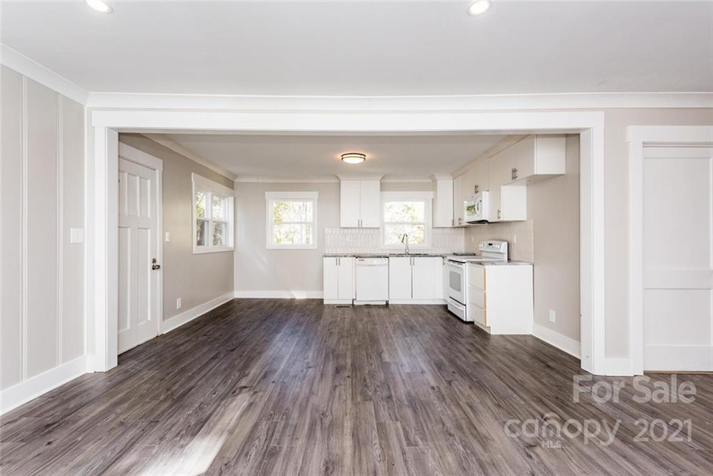 87-j R J R Sayles Road Canton, NC 28716 - Photo 6 of 22 a view of kitchen with wooden floor and window