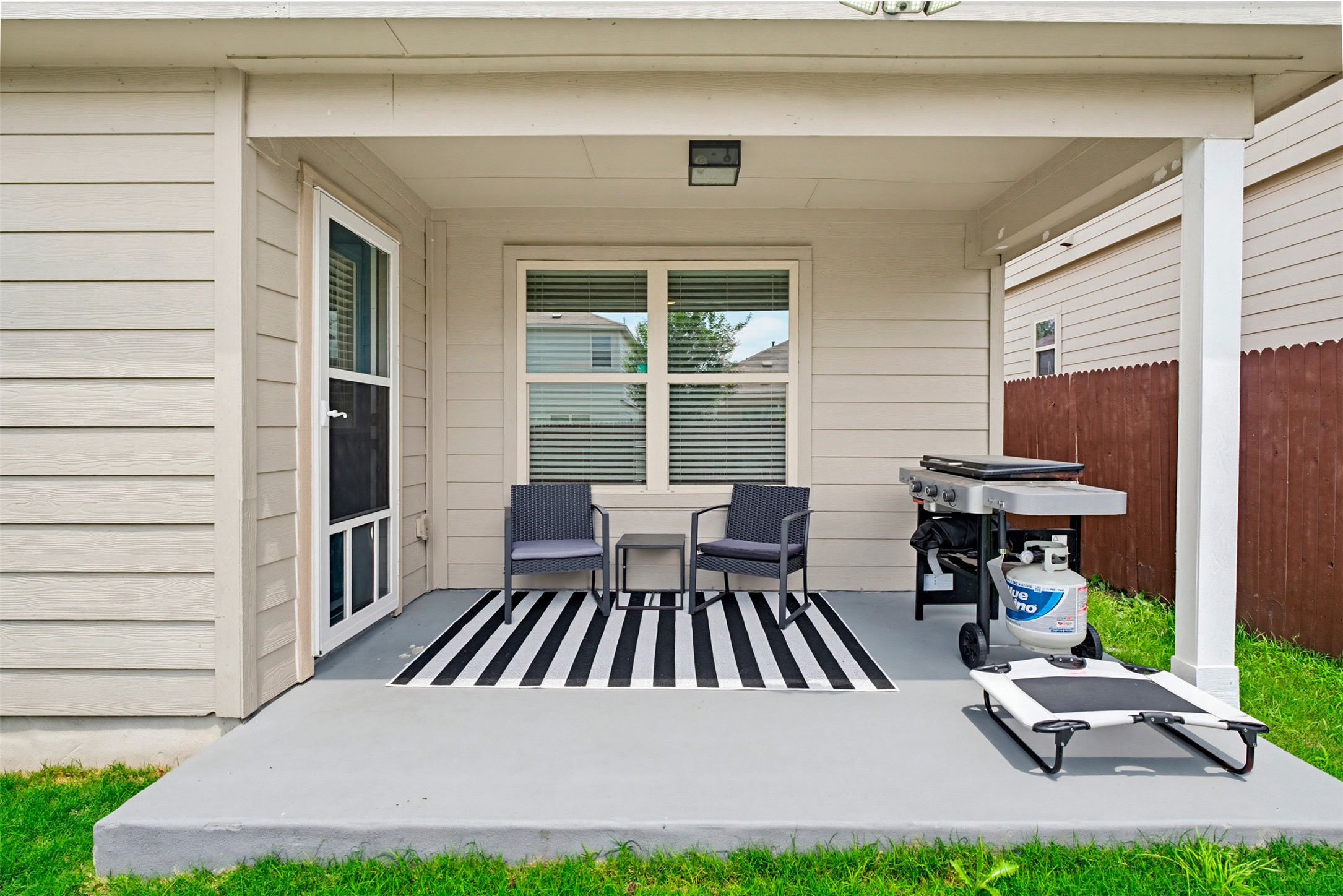 5705 Southerner Way Austin, TX 78747 - Photo 18 of 22 A welcoming patio area offers ample space for outdoor cooking and entertaining.
