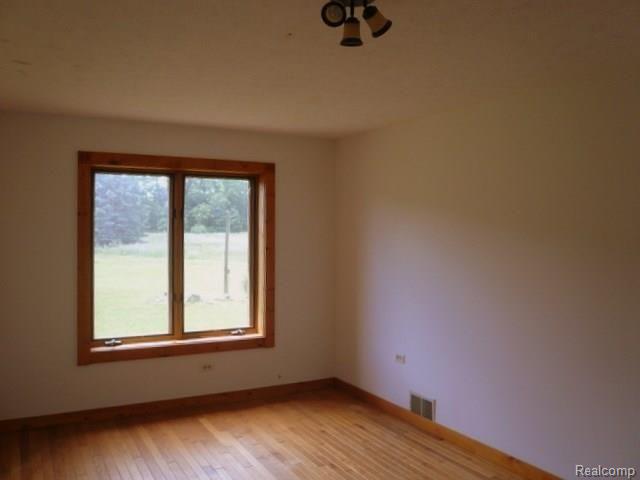 7888 Byron Road Howell, MI 48855 - Photo 17 of 26 17 MAIN FLOOR BEDROOM 2.jpg