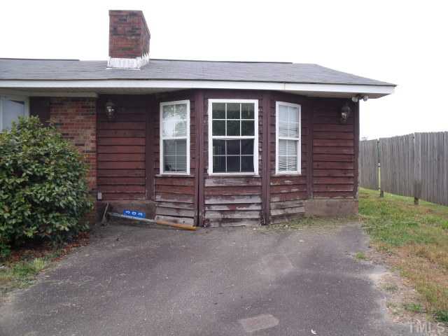 303 Princeton Road Princeton, NC 27569 - Photo 3 of 3 a view of a house with a yard